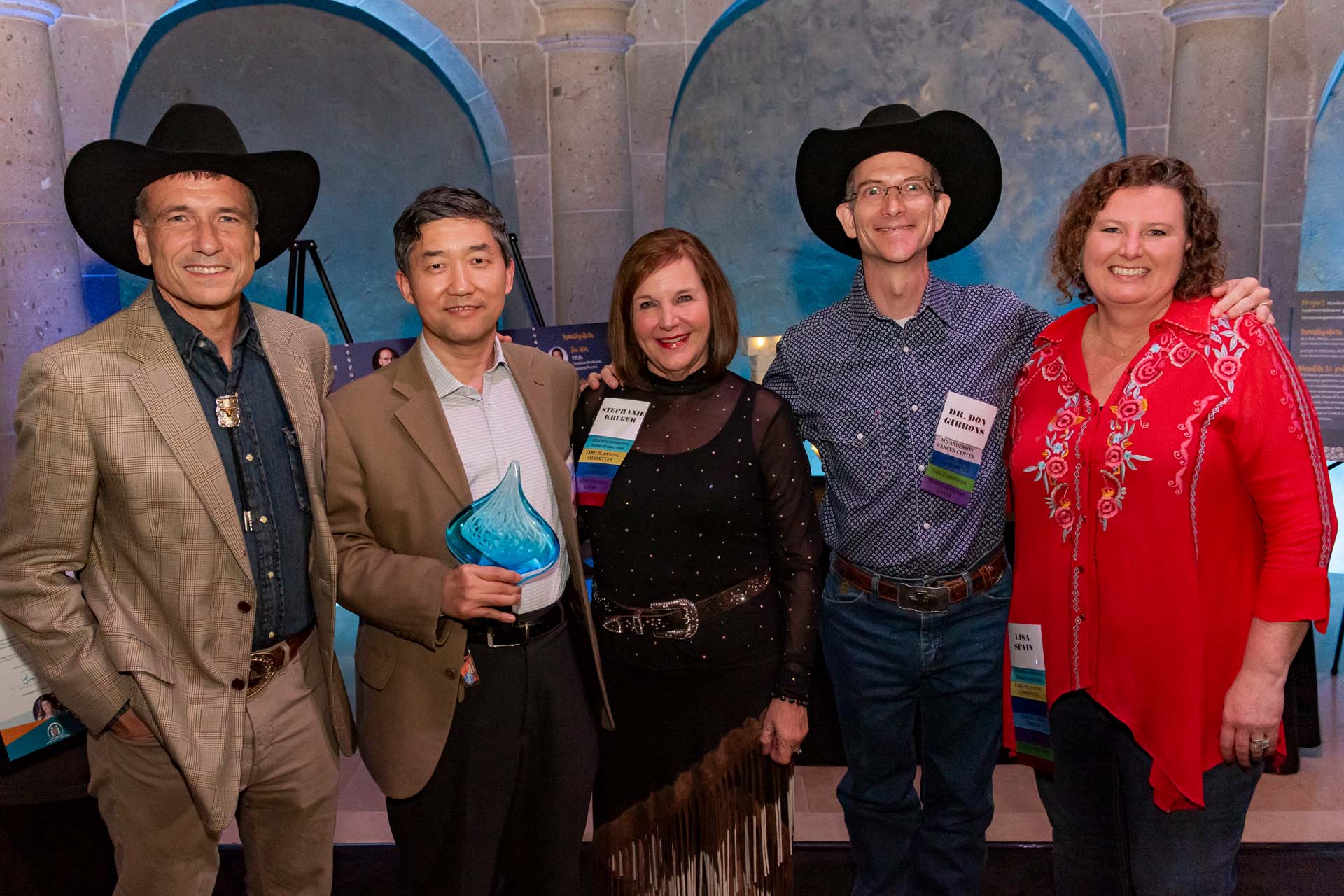 Image of Left to right: Dr. Heymach (Medical Advisor of Rexanna's Foundation), Dr. Jianjun Zhang (M.D. Anderson), Stephanie Kruger (President), Dr. Don Gibbons (Scientific Advisor of Rexanna's Foundation), Lisa Spain (Executive Director).