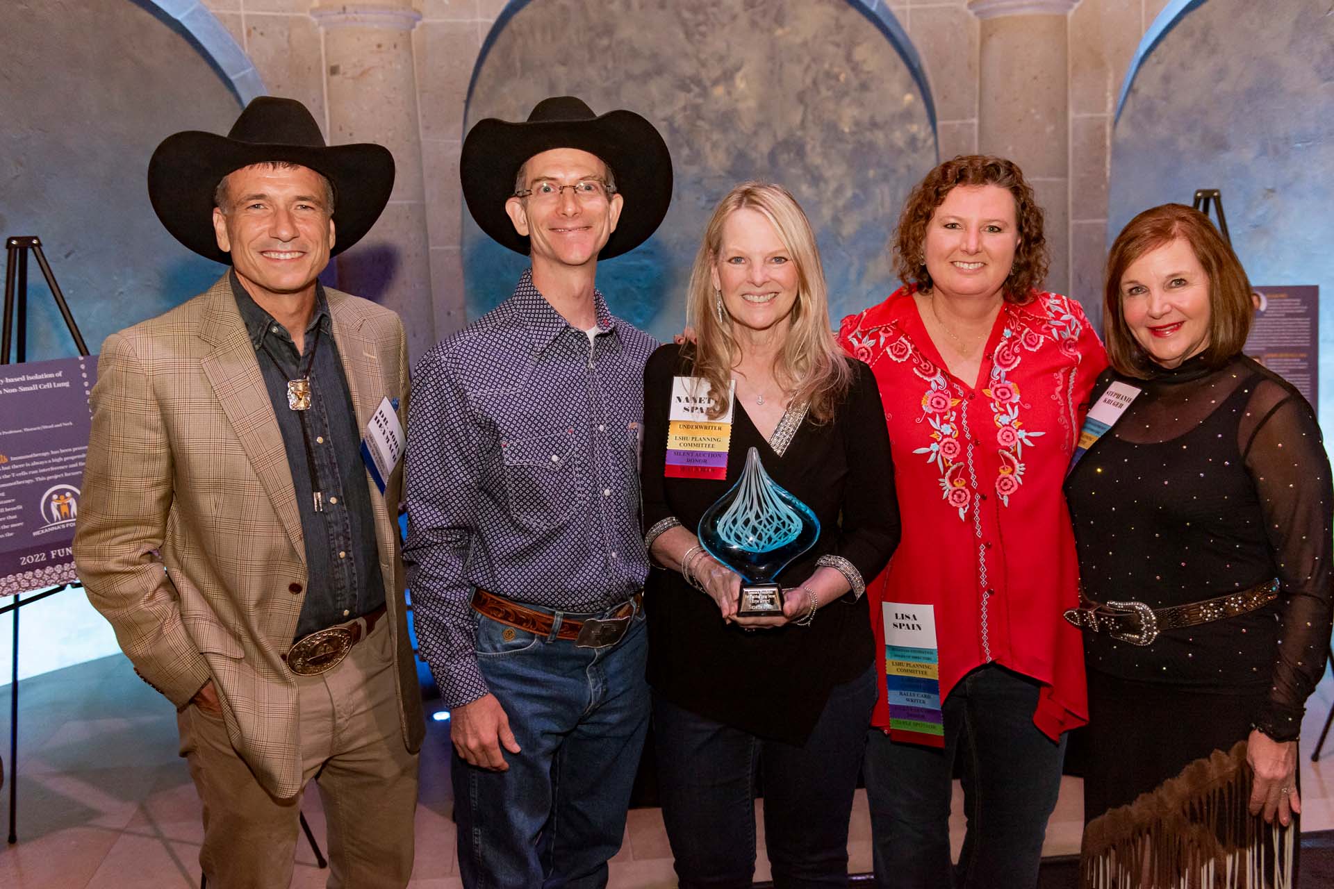 Image of Left to right: Dr. Heymach (Medical Advisor of Rexanna's Foundation), Dr. Gibbons (Scientific Advisor of Rexanna's Foundation), Nanette Spain, Lisa Spain (Executive Director), Stephanie Kruger (President)